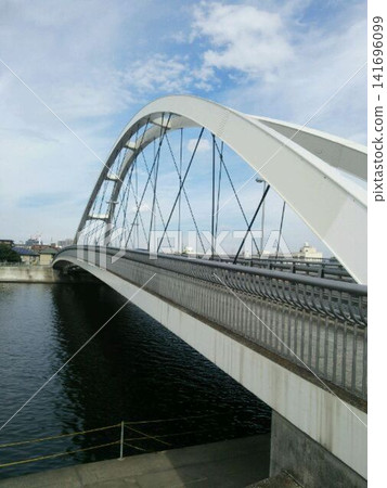 Blue sky and a bridge over the Tsurumi River Blue sky and a bridge over the Tsurumi River 141696099