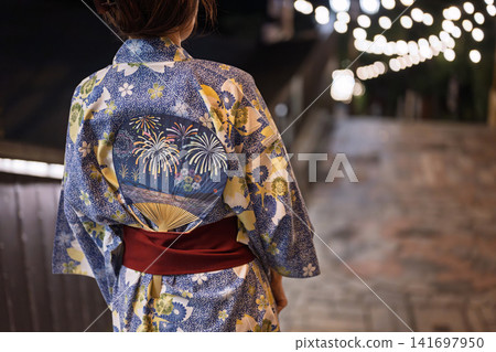 A woman in a yukata A woman in a yukata 141697950