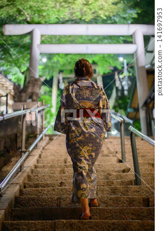 A woman in a yukata A woman in a yukata 141697953