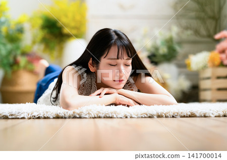 Japanese woman sleeping in her room Japanese woman sleeping in her room 141700014
