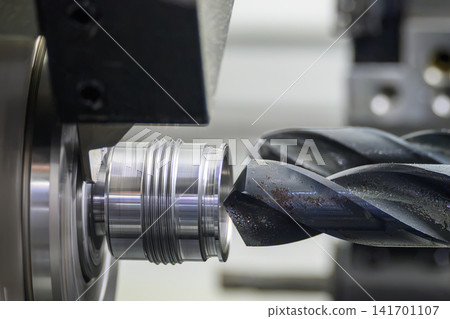 Hole drilling process on precision part using multitasking CNC Swiss type lathe. Hole drilling process on precision part using multitasking CNC Swiss type lathe. 141701107