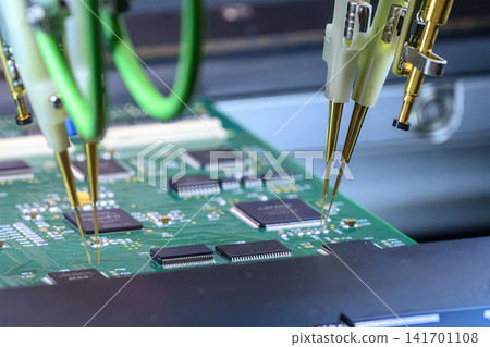 Automated system performing quality control inspection on electronic circuit boards mass production. 141701108