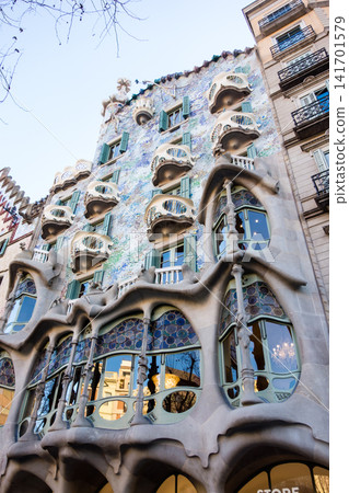 Casa Batlló, designed by Antoni Gaudí, is an artistic building that stands amidst the streets of Barcelona, Spain. Casa Batlló, designed by Antoni Gaudí, is an artistic building that stands amidst the streets of Barcelona, Spain. 141701579