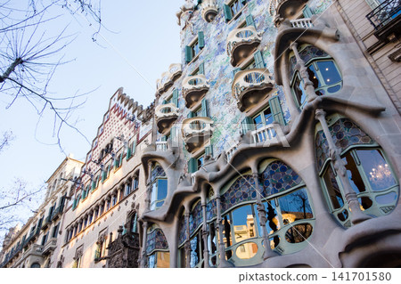 Casa Batlló, designed by Antoni Gaudí, is an artistic building that stands amidst the streets of Barcelona, Spain. Casa Batlló, designed by Antoni Gaudí, is an artistic building that stands amidst the streets of Barcelona, Spain. 141701580