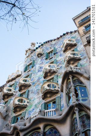 Casa Batlló, designed by Antoni Gaudí, is an artistic building that stands amidst the streets of Barcelona, Spain. Casa Batlló, designed by Antoni Gaudí, is an artistic building that stands amidst the streets of Barcelona, Spain. 141701581