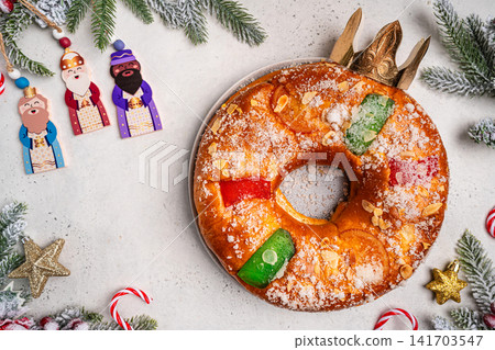Roscon de reyes is a traditional Spanish Christmas pastry cake Roscon de reyes is a traditional Spanish Christmas pastry cake 141703547