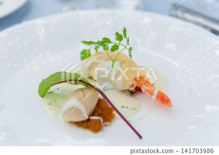 French seafood appetizer plate - part of a wedding reception course menu 141703986