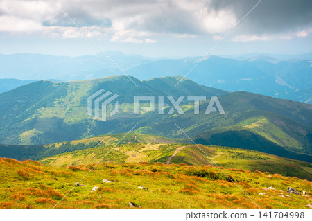carpathian mountain landscape in august. scenic alpine terrain of ukraine in the afternoon. background image for hiking through chornohora ridge. popular travel destination carpathian mountain landscape in august. scenic alpine terrain of ukraine in the afternoon. background image for hiking through chornohora ridge. popular travel destination 141704998