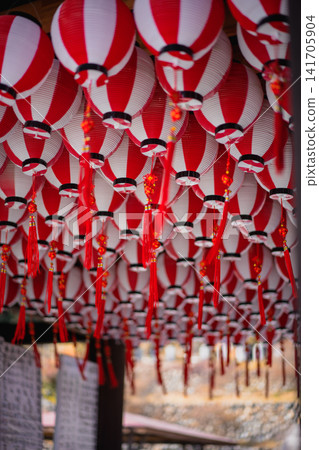 A fantastical corridor of red and white lanterns A fantastical corridor of red and white lanterns 141705904