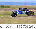 Off-road buggies driving on dirt courses along the Sea of Japan coast 141706241