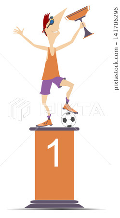The footballer wins the match. Football player with a winner cup standing on the podium of the winner The footballer wins the match. Football player with a winner cup standing on the podium of the winner 141706296