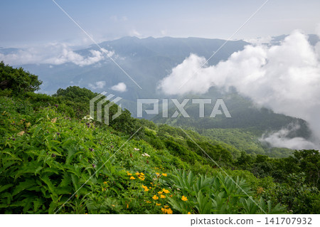 Scenery during a climb of Mt. Kurodake in Hokkaido Scenery during a climb of Mt. Kurodake in Hokkaido 141707932
