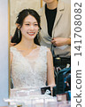 Bride getting her makeup done in the bridal room - wedding Bride getting her makeup done in the bridal room - wedding 141708082