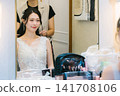 Bride getting her makeup done in the bridal room - wedding Bride getting her makeup done in the bridal room - wedding 141708106