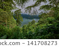Bali Twin Lakes Viewpoint overlooks both Tamblingan Lake and Buyan Lake in Munduk, Bali Indonesia. Bali Twin Lakes Viewpoint overlooks both Tamblingan Lake and Buyan Lake in Munduk, Bali Indonesia. 141708273