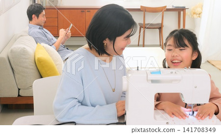 Family conversation sewing machine image Family conversation sewing machine image 141708349