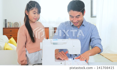 Family conversation sewing machine image Family conversation sewing machine image 141708415