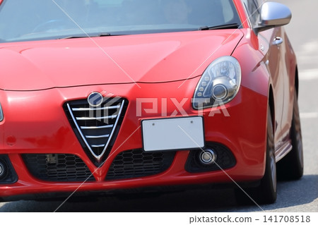 A red Italian sports car A red Italian sports car 141708518