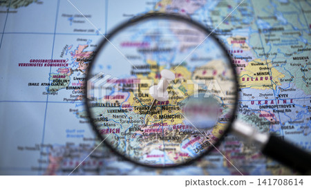 Magnifying glass focuses on a map of Stuttgart with highlighted locations Magnifying glass focuses on a map of Stuttgart with highlighted locations 141708614