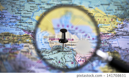 Map with a pin and magnifying glass showing Mashhad location Map with a pin and magnifying glass showing Mashhad location 141708631