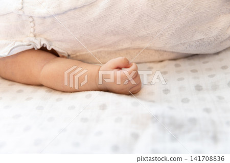 Arm of a one-month-old baby Arm of a one-month-old baby 141708836
