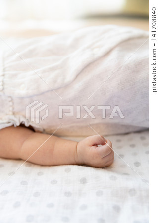 Arm of a one-month-old baby Arm of a one-month-old baby 141708840