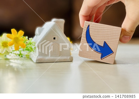 House and downward arrow House and downward arrow 141708985