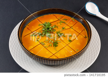 silky Smooth Steamed Egg Custard Garnished With Fresh Cilantro Leaves silky Smooth Steamed Egg Custard Garnished With Fresh Cilantro Leaves 141710195