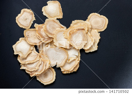 dried ginseng root slices for herbal soup and wellness tea dried ginseng root slices for herbal soup and wellness tea 141710502