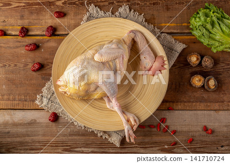 whole raw free-range chicken prepared for culinary cooking whole raw free-range chicken prepared for culinary cooking 141710724