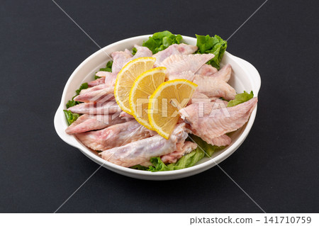 fresh raw chicken wingtips for making rich broth and stock fresh raw chicken wingtips for making rich broth and stock 141710759