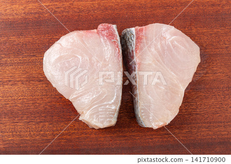 raw bighead carp meat portion ready for steaming and broth raw bighead carp meat portion ready for steaming and broth 141710900