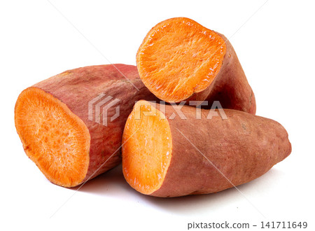 raw orange flesh sweet potato whole and sliced raw orange flesh sweet potato whole and sliced 141711649