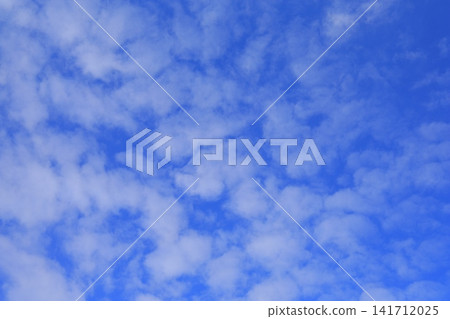 Clouds floating in the blue sky Clouds floating in the blue sky 141712025