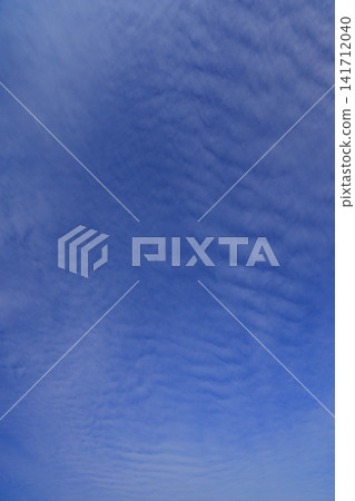 Clouds floating in the blue sky Clouds floating in the blue sky 141712040