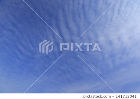 Clouds floating in the blue sky Clouds floating in the blue sky 141712041