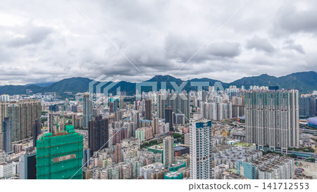 Hong Kong Aug 1 2026 skyline and mountains in Ma Tau Wai Hong Kong Aug 1 2026 skyline and mountains in Ma Tau Wai 141712553