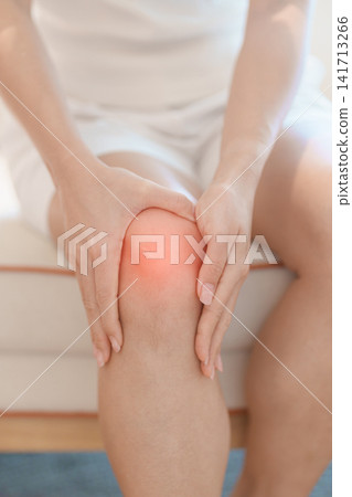 woman having knee ache and muscle pain due to Runners Knee or Patellofemoral Pain Syndrome, osteoarthritis, arthritis, rheumatism and Patellar Tendinitis. health and medical concept woman having knee ache and muscle pain due to Runners Knee or Patellofemoral Pain Syndrome, osteoarthritis, arthritis, rheumatism and Patellar Tendinitis. health and medical concept 141713266