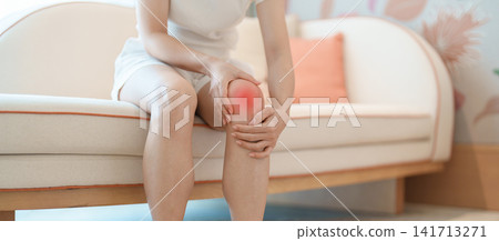 woman having knee ache and muscle pain due to Runners Knee or Patellofemoral Pain Syndrome, osteoarthritis, arthritis, rheumatism and Patellar Tendinitis. health and medical concept woman having knee ache and muscle pain due to Runners Knee or Patellofemoral Pain Syndrome, osteoarthritis, arthritis, rheumatism and Patellar Tendinitis. health and medical concept 141713271