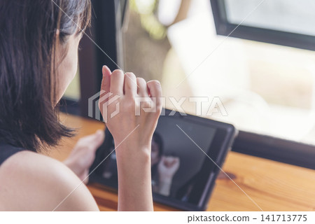 Woman hands using smartphone digital technology tablet empty blank screen. Close up Hands women holding smart tablet touch screen shopping online, call. Woman using mock up mobile at home office Woman hands using smartphone digital technology tablet empty blank screen. Close up Hands women holding smart tablet touch screen shopping online, call. Woman using mock up mobile at home office 141713775