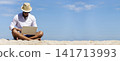 Banner Man traveler use laptop on summer beach blue sky. Asian man travel relax sitting summer beach island. Man typing laptop computer holiday business trip freelance working online with copy space 141713993
