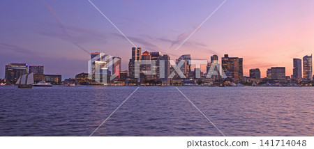 Boston skyline illuminated at dusk with Atlantic Ocean on the foreground, USA Boston skyline illuminated at dusk with Atlantic Ocean on the foreground, USA 141714048