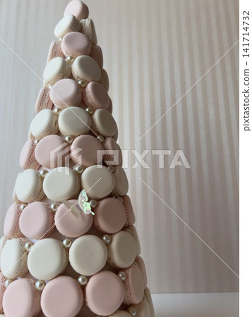 An elegant macaron tower and butterflies An elegant macaron tower and butterflies 141714732