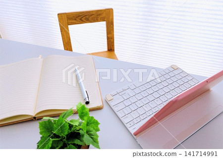 A simple workspace set up by the window. A simple workspace set up by the window. 141714991