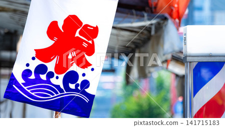 A summery scene: a shaved ice flag fluttering in the breeze in a shopping street in the middle of summer. A summery scene: a shaved ice flag fluttering in the breeze in a shopping street in the middle of summer. 141715183