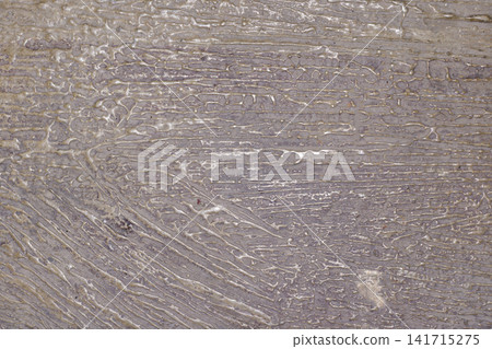 Detailed close-up shot of an abstract gold and bronze metallic textured surface with thick paint lines and liquid wave patterns for artistic background design. High Quality Photo Detailed close-up shot of an abstract gold and bronze metallic textured surface with thick paint lines and liquid wave patterns for artistic background design. High Quality Photo 141715275