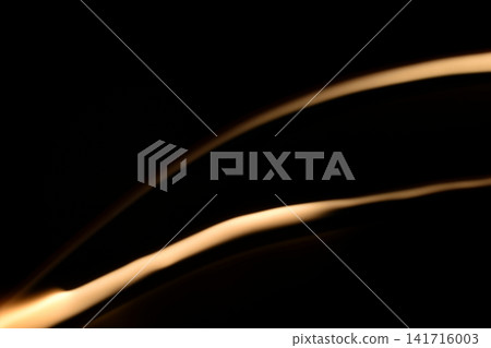 Abstract flame texture on a dark background. Abstract flame texture on a dark background. 141716003