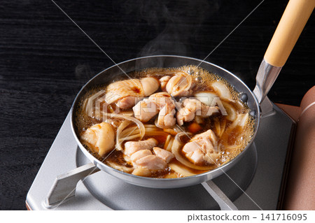 Oyakodon (chicken and egg rice bowl) being prepared (before adding the egg) Oyakodon (chicken and egg rice bowl) being prepared (before adding the egg) 141716095