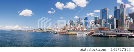Bright and sunny panoramic view of Seattle skyline from the water Bright and sunny panoramic view of Seattle skyline from the water 141717593
