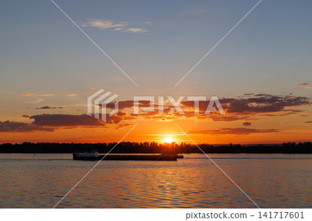 Golden sunset over river landscape 141717601